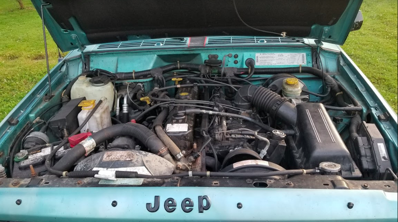 Illustration for article titled My Beloved 'Project Swiss Cheese' Died to Give Life to This Two-Door 1995 Jeep Cherokee